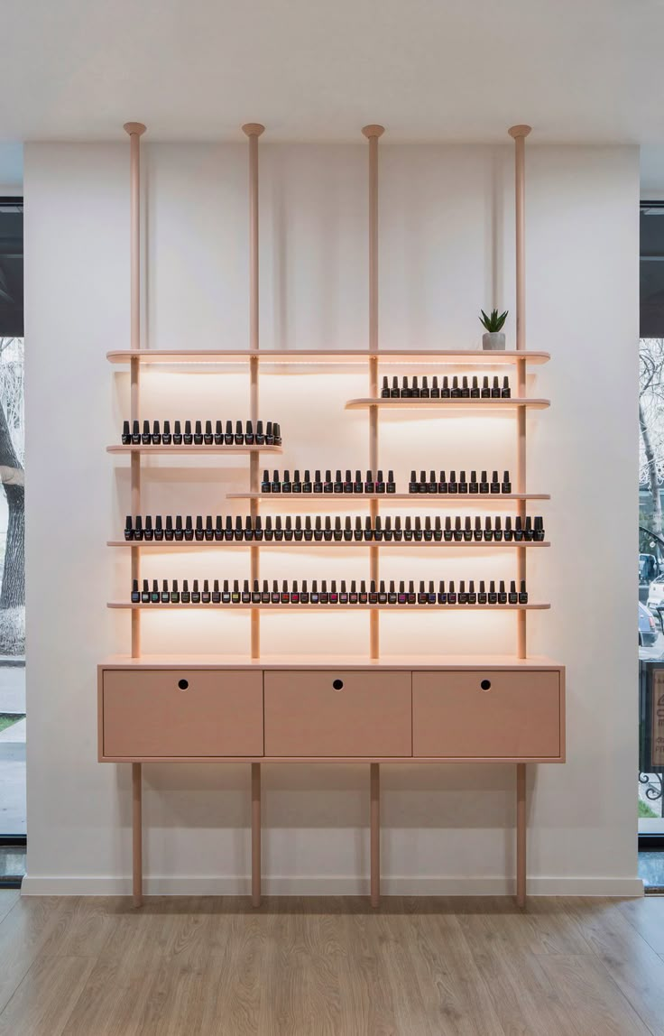 an empty room with shelves filled with bottles