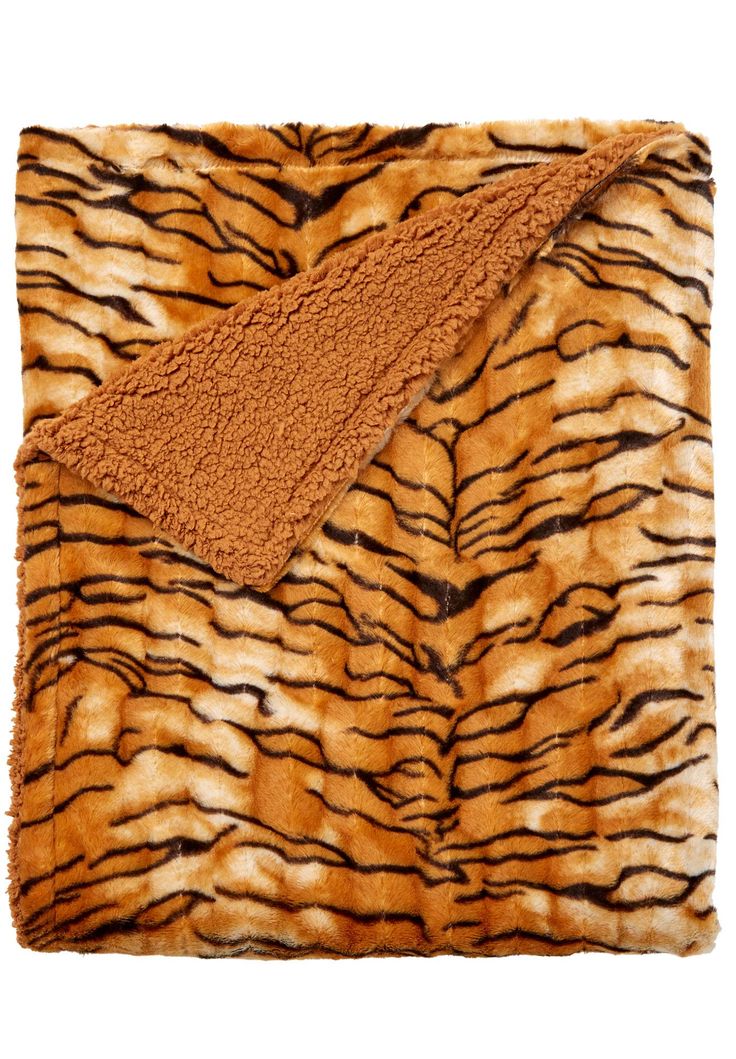 a brown and black animal print blanket