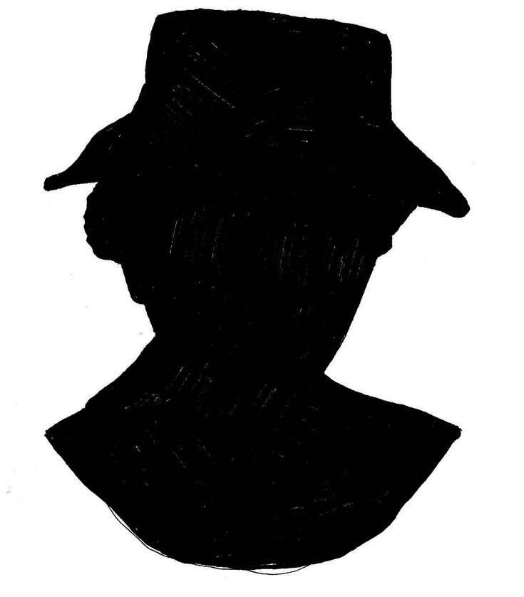 the silhouette of a man wearing a hat