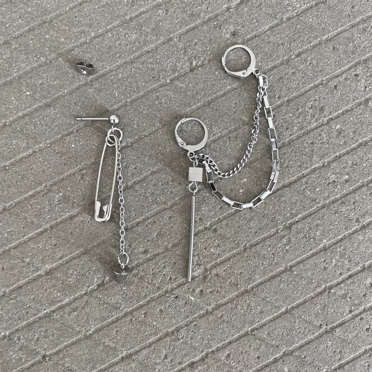 Add a touch of edgy style to your wardrobe with these hipster safety pin mismatched earrings featuring double hoop dangle accents. These unique earrings are perfect for adding a bold and playful twist to your look. Stand out from the crowd and show off your individuality with these trendy and eye-catching earrings. Handmade with care, these earrings are sure to become a favorite in your jewelry collection. ▪️▪️▪️PRODUCT 316L surgical stainless steel  Never Fade and Hypoallergenic One Pair of Earring ( 2pc ) VISIT STORE FOR MORE PRODUCT 🔗 https://www.etsy.com/ca/shop/TWISTEEL ▪️▪️▪️ S H I P P I N G   All orders will be shipped on the next business day UNITED STATES  - USPS First-Class Mail * 4 - 14 Business Days  Tracking & Insurance included CANADA - Canada Post * 4 - 14 Business Days Tra Cheap Emo Style Party Jewelry, Cheap Pendant Necklaces For Streetwear, Affordable Edgy Stainless Steel Jewelry, Heart Safety Pin Earrings Target, Affordable Silver Edgy Earrings, Cheap Nickel-free Punk Jewelry, Cheap Adjustable Jewelry For School, Cheap Edgy Stainless Steel Jewelry, Cool Earrings Hot Topic