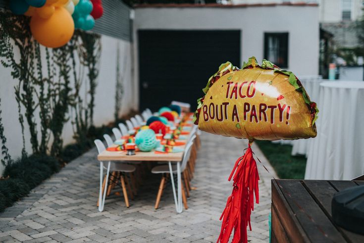 a taco themed party is set up outside