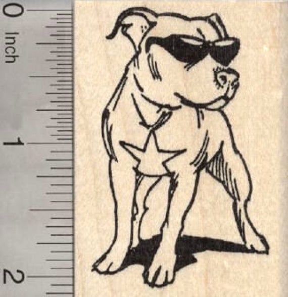 a rubber stamp with a dog wearing sunglasses