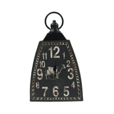 a black clock with white numbers on the face and hands is hanging from a chain