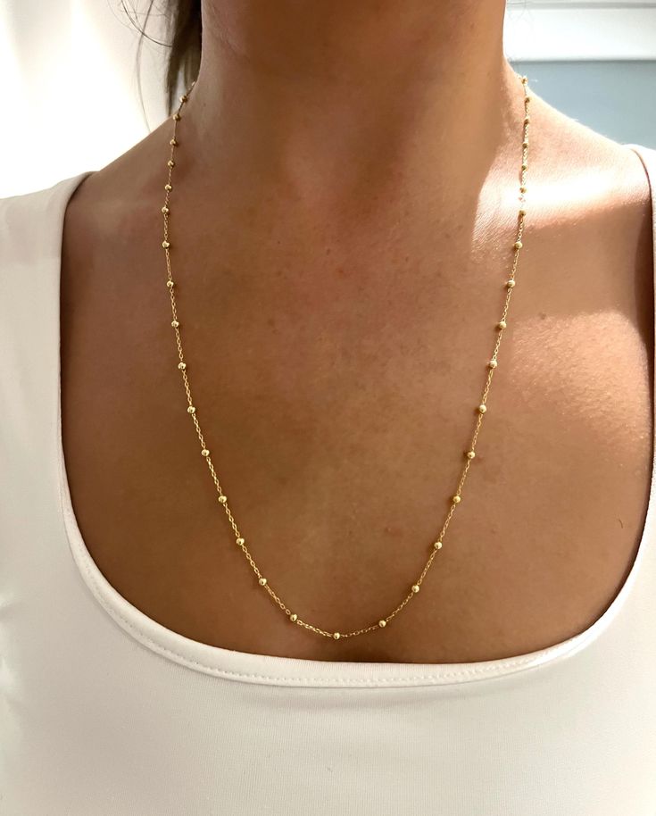 This Chain is modern, dainty, minimalist-style necklace looks great when worn alone as well as layered with other necklaces. It is a fantastic accessory to wear both daily and on special occasions. It is a great gift option! Material 925 Sterling Silver gold Fill All items made to order. Production starts within 12 hours and ships within 48 hours. ♥ TAKE A GOOD CARE OF YOUR JEWELRY ♥ Please follow these tips to keep it longer; * Store in dry place. Please take it off before taking a bath. * Keep perfume, sunscreen and other similar chemicals away from your jewelry. *Keep it in its own box when not wearing it. My processing time is 3-5 business days and depending on your shipping choice at the checkout, you should receive your order in approximately 5-10 days of your order date. Minimalist Long Cable Chain Necklace, Beaded Chain Necklace For Everyday, Dainty Chain Layered Necklace For Everyday, Dainty Everyday Necklace With Beaded Chain, Simple Everyday Layered Necklace With Delicate Chain, Minimalist Ball Chain Necklace As Gift, Minimalist Ball Chain Necklace For Gift, Minimalist Layered Necklace With Satellite Chain, Minimalist Beaded Chain Layered Necklace