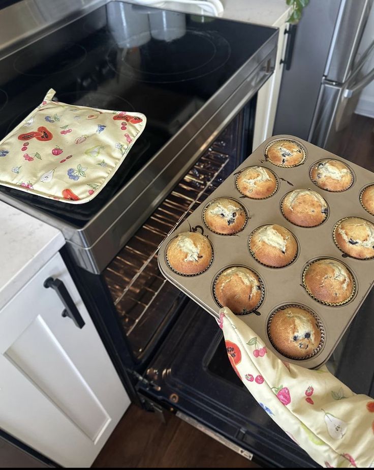 muffins are being prepared in the oven for baking