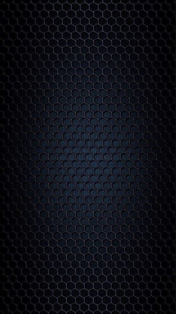 an abstract black background with hexagonal grids