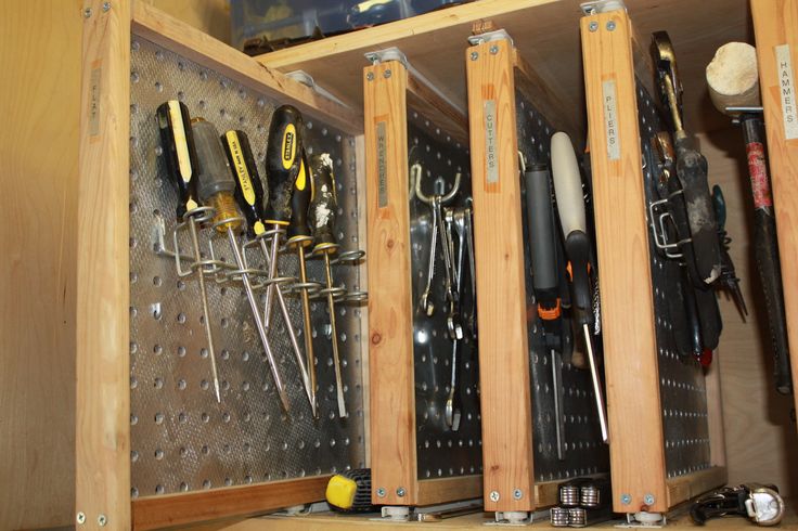 a cabinet filled with lots of different tools