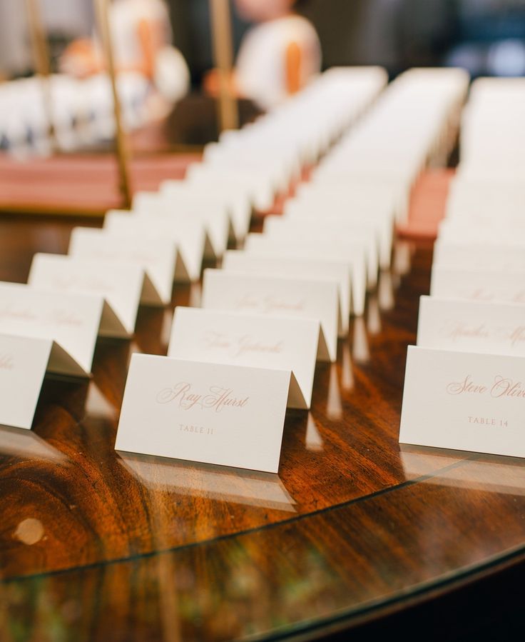 place cards are lined up on a table