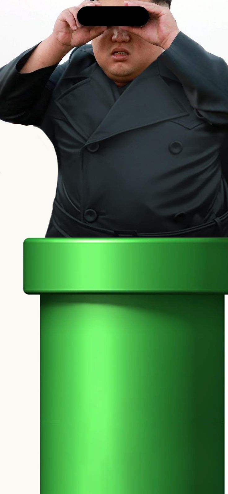 a man in a green hat and trench coat holding his hands to his face while standing behind a green trash can