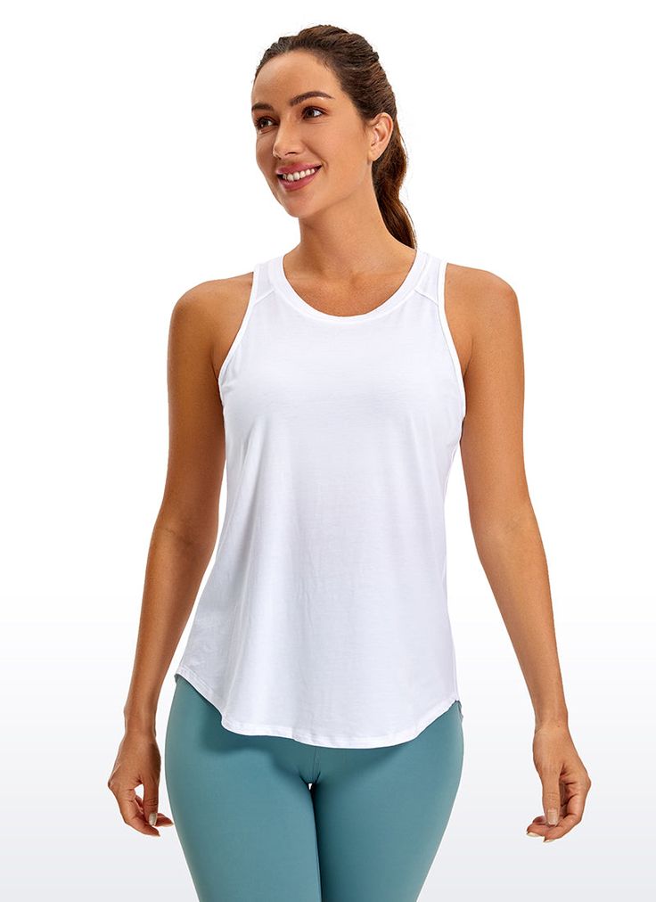 This yoga tank top hits exactly where you want it to. Open Back shows beautiful curves and feminine lines. Long hem and tie back design can freely adjust the tightness. Feature & Fitting: 
 Pima Cotton collection 
 Design for yoga 
 Slightly loose fit, round neck 
 Open back and tie back 
 Fabric: 
 Super soft and skin-friendly 
 Naturally breathable 
 Lightweight and stretchy 
 92% Pima cotton,8% Spandex 
 SKU : R774 .Easy reach by searching the SKU Versatile Tank Top For Pilates And Summer, Versatile Sleeveless Tops With Light Support, Summer Tank Top With Built-in Bra For Light Exercise, Athleisure Scoop Neck Tank Top For Yoga, Sleeveless Sports Bra For Pilates, Solid Color Racerback Tank Top For Pilates, Solid Cami Tops For Gym, Summer Yoga Tops With Light Support, Stretch Tank Top With Light Support