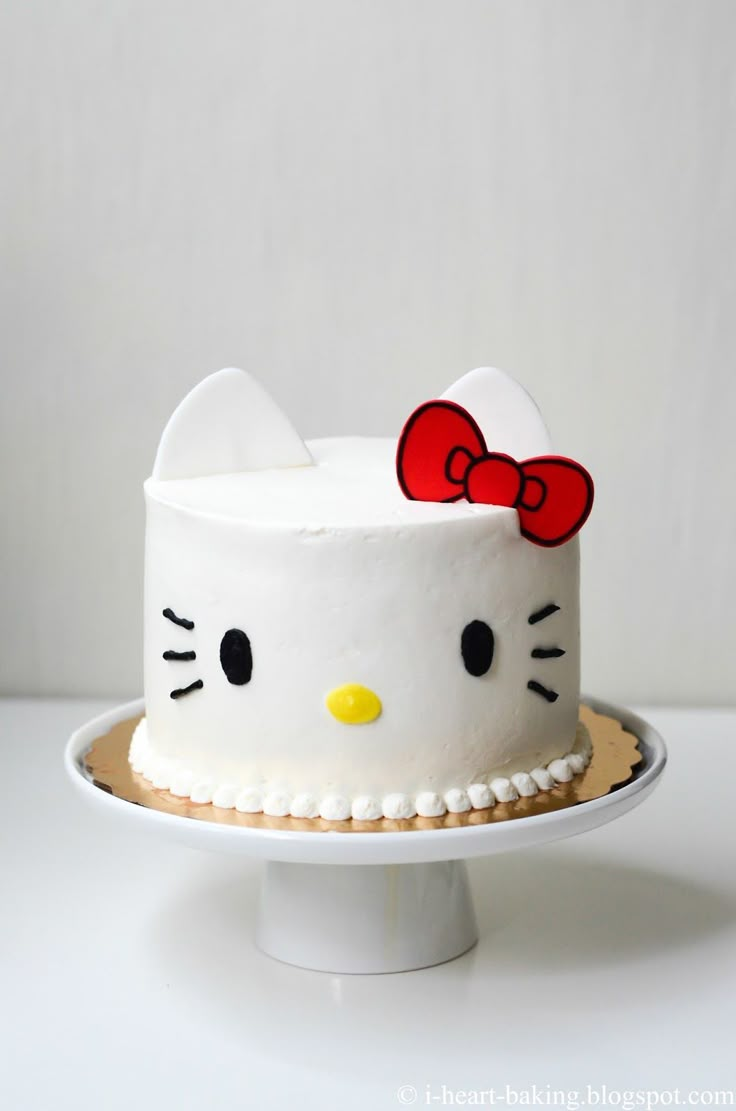 a hello kitty cake on a white plate