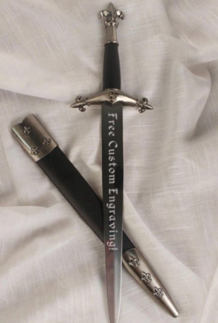 two knifes laying on top of each other on a white sheet with the words fear, confusion and truth written on it