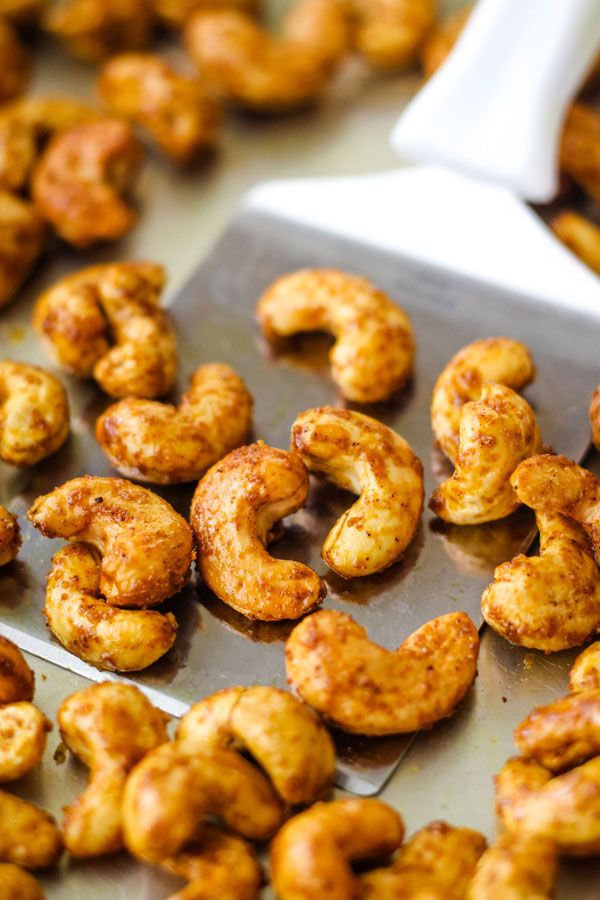 some fried food is being prepared on a tray and ready to be cooked in the oven