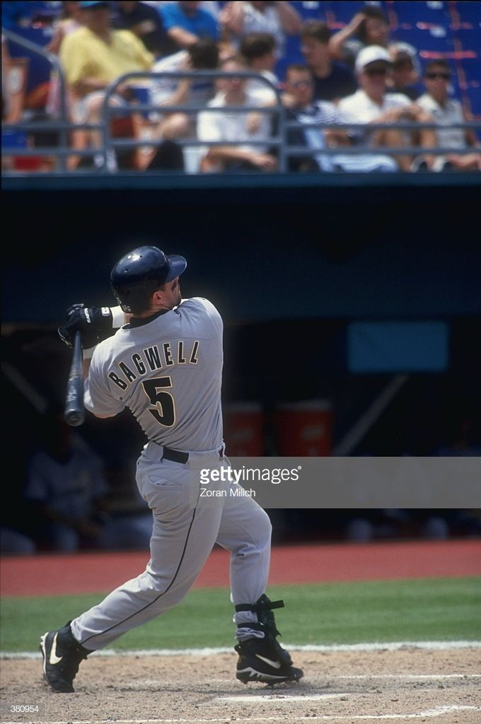 professional baseball player swinging his bat during a game