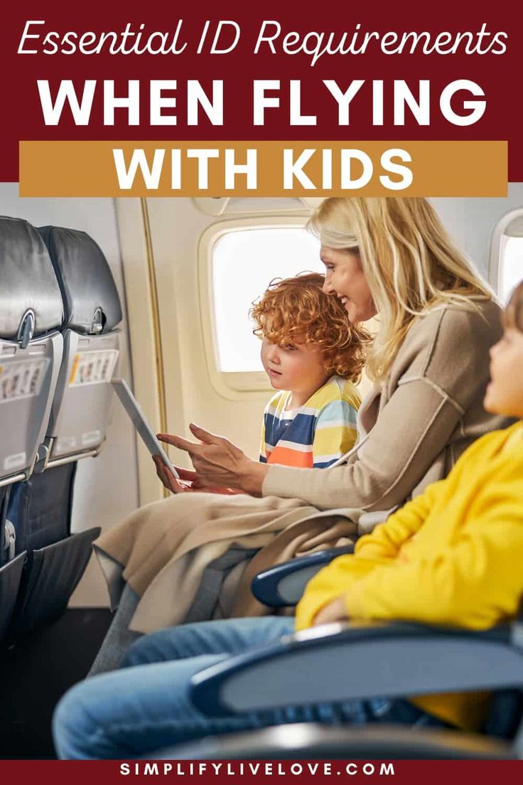 a woman and child sitting on an airplane with the text essentials for flying with kids