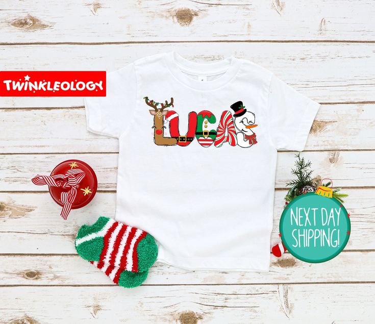 "Personalized Christmas Kids Shirt - Cute Christmas Name Toddler Shirt - Personalized Custom Name Toddler Shirt - Custom Christmas Shirt If you're like us and love your kid looking cute all the time, then this super soft, Christmas Shirt is going to make your day! Designed with stylish mamas in mind. **Sizing Tip** Shirts are designed on 100% Cotton. They tend to run true to size. They have a ribbed collar, double needle stitched and bottom hemmed. HOW TO ORDER: 1. Choose the quantity you would like to purchase. 2. Enter any specific notes you would like seller to know in the \"Note to Seller\" section. 3. Click \"Add to cart\". For multiple items go back to the listings and repeat the same steps /DETAILS - 100% Cotton - Machine Washable - Short Sleeve - 100% Handmade in the USA /CARE INST Christmas Shirts Vinyl, Soft Christmas, Christmas Shirts For Kids, Christmas Names, Christmas Kids, Kids Graphic Tees, Iron On Vinyl, Cute Christmas, Toddler Sizes