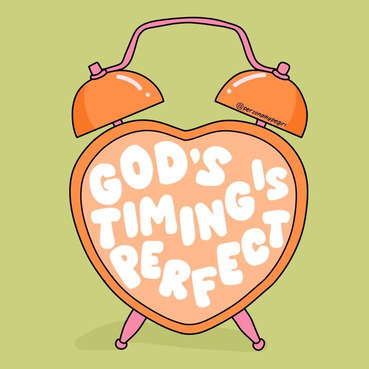 an orange heart shaped alarm clock with the words god's time is perfect