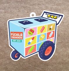 a sticker depicting a toy truck with wheels on the front and side, that says fuchila fresheners