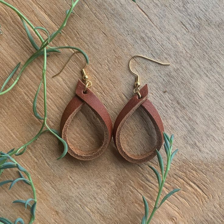 Leather Hoop Earrings – Haute JS Design Leather Earrings Diy How To Make, Folded Leather Earrings, Leather Strip Earrings, Leather And Wire Jewelry, Crafts With Leather Scraps, Leather Earring Patterns Free, Leather Diy Earrings, Braided Leather Earrings Diy, Homemade Leather Earrings