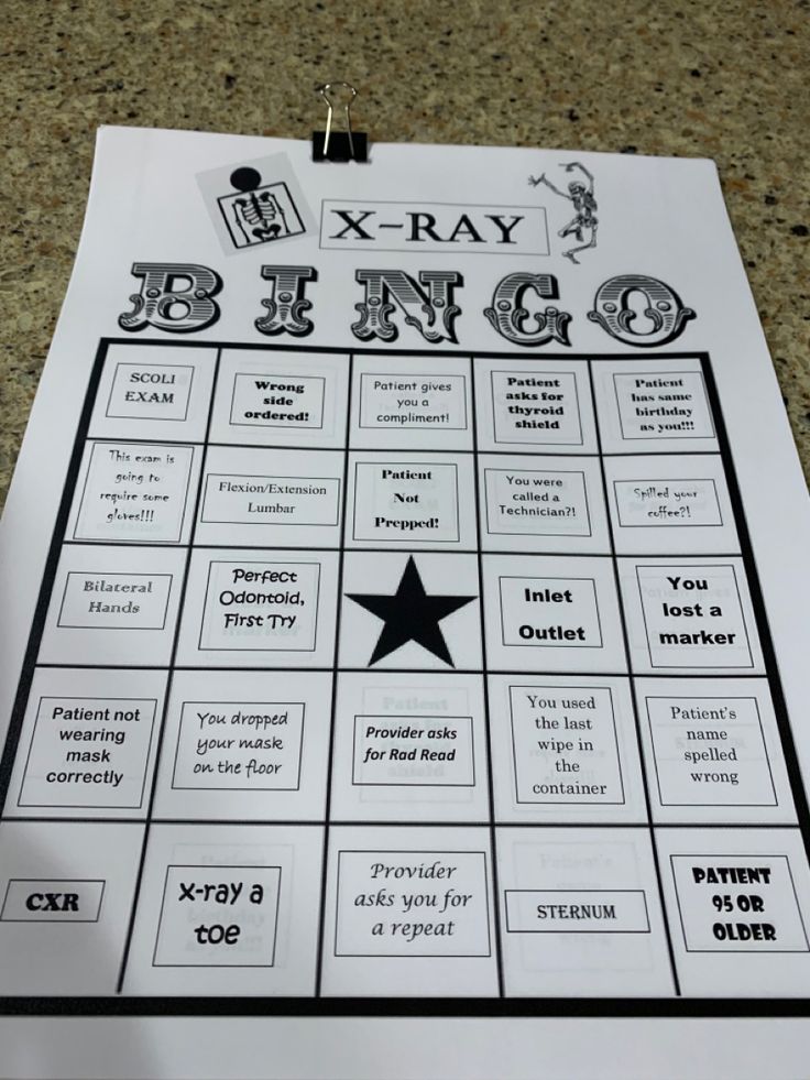 a printable x - ray bingo game is shown on the floor in front of a table