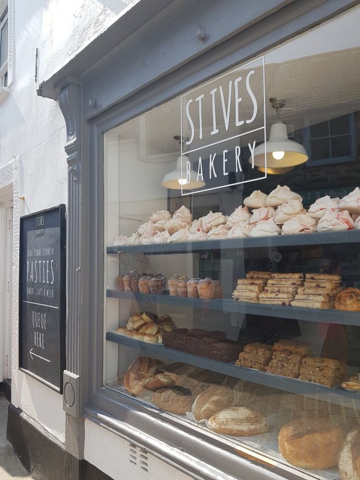 a bakery with lots of baked goods in the window