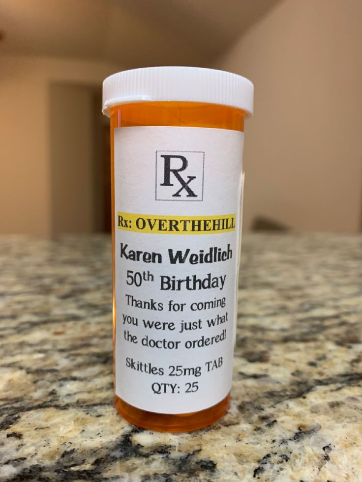 a prescription bottle sitting on top of a counter