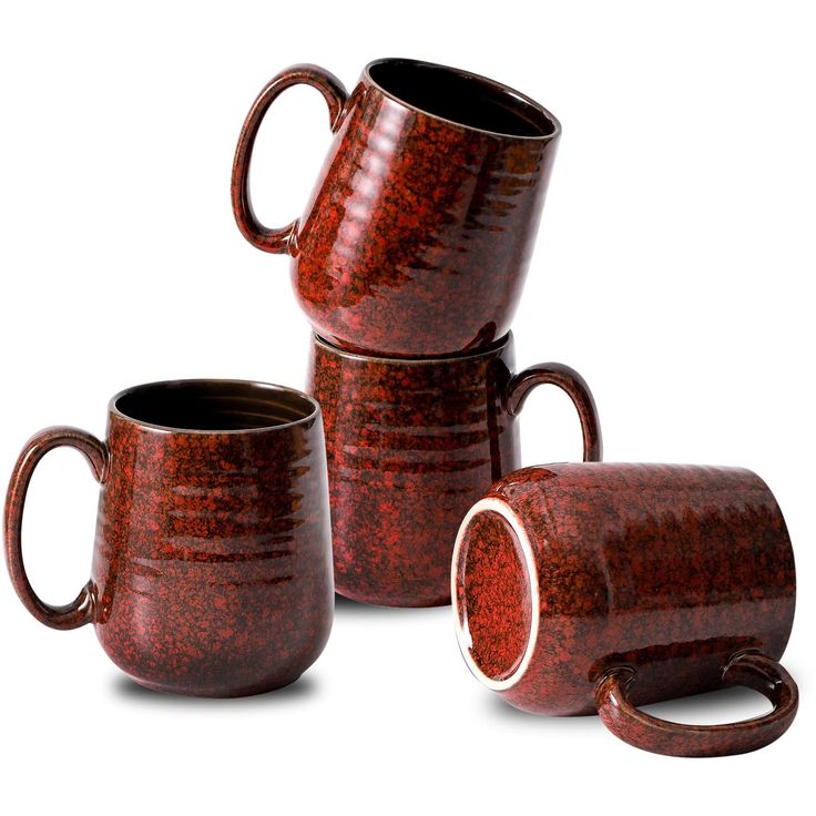 three red mugs stacked on top of each other