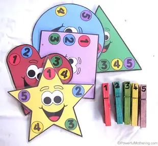 three star shaped numbers with markers and crayons next to them