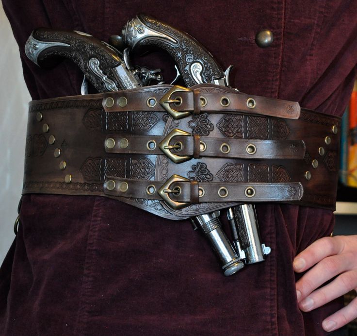 A belt, perfect for cosplay. Viking or pirate style. Belt has 2 metal rings to hang additional equipment. Pistols are not included. Size: Standard Length:  From 87,5 cm  (34,45 inches) to 97,5 cm (38,39 inches) - can be customized Width: - narrowest: 10,1 cm (3,98 inches) - widest: 13,3 cm (5,24 inches) Skin thickness: 3 mm (0,12 inches) - 4 mm (0.15 inches)  I can customize the size of the belt. If you want to, please select the "CUSTOM SIZE" option and write me your belly/waist circuit in the Warlock Costume, Medieval Belt, Pirate Fashion, Fantasy Style, Larp Costume, Utility Belt, Costume Cosplay, Suspender Belt, Larp