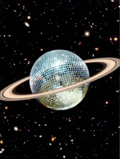 a disco ball in the middle of a galaxy with stars around it and an image of saturn