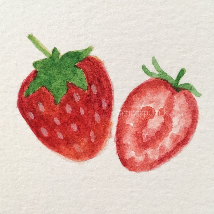 two strawberries painted on white paper with green leaves and one red strawberry sitting next to each other