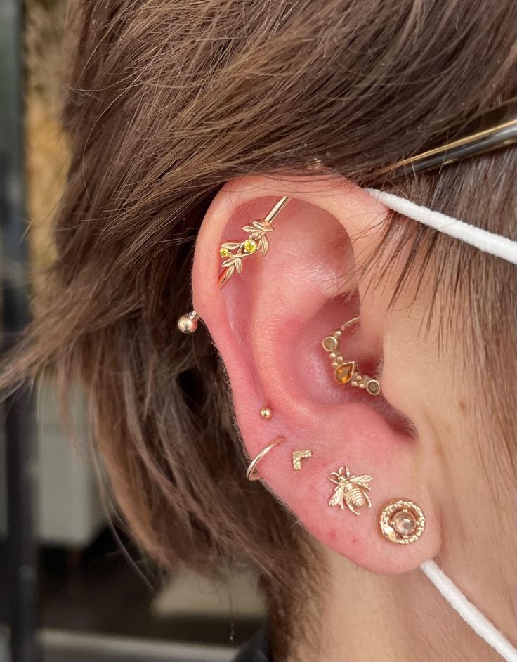 a person with ear piercings on their ears