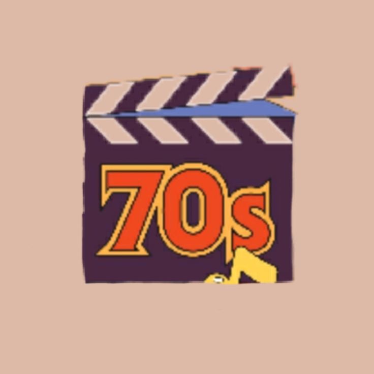 the 70's movie clapper is shown with an arrow pointing up to it