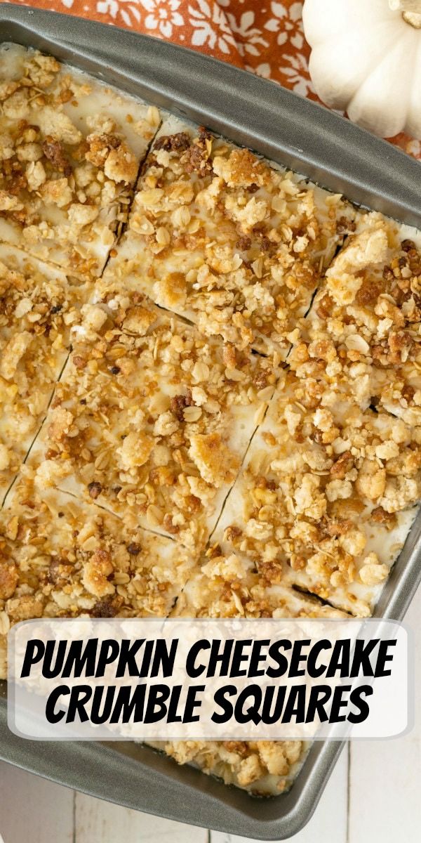 pumpkin cheesecake crumble squares in a baking pan with the words pumpkin cheesecake crumble squares