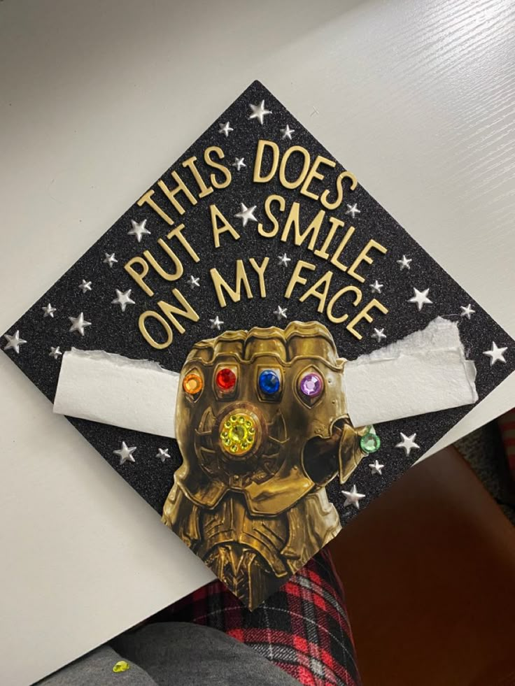 a graduation cap with the words, this does't put a smile on my face