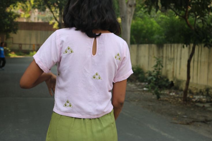 "Linen top for women, Light pink top, Linen crop top, Linen blouse, Made to order, Custom made, Plus Size Hand embroidered linen blouse perfect for a sunny day! Goes best with the trendy linen skirt! -Model height: 5'3\" wearing size S -Length: 19.5\" -Fit: straight The top is hand embroidered with maggam work. This is a one of a kind of hand work called Maggam embroidery. Maggam work is exquisite needlework of repeated fine chain stitches, worked in multi-coloured silk on a satin or cotton grou Linen Tops With Floral Embroidery And Short Sleeves, Short Sleeve Linen Top With Floral Embroidery, Short Sleeve Linen Tops With Floral Embroidery, Fitted Linen Top With Floral Embroidery, Pink Cotton Cropped Shirt, Pink Summer Crop Top Shirt, Pink Summer Cropped Shirt, Summer Linen Tops With Floral Embroidery, Embroidered Summer Crop Top