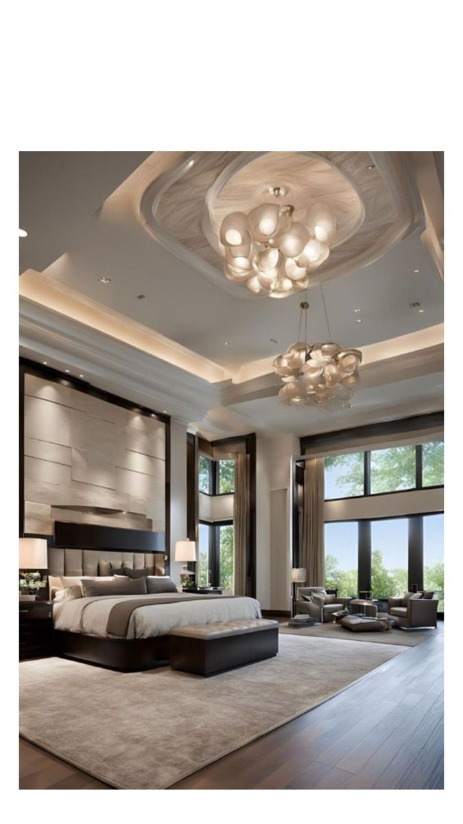 a large bedroom with lots of windows and lights on the ceiling, along with an area rug