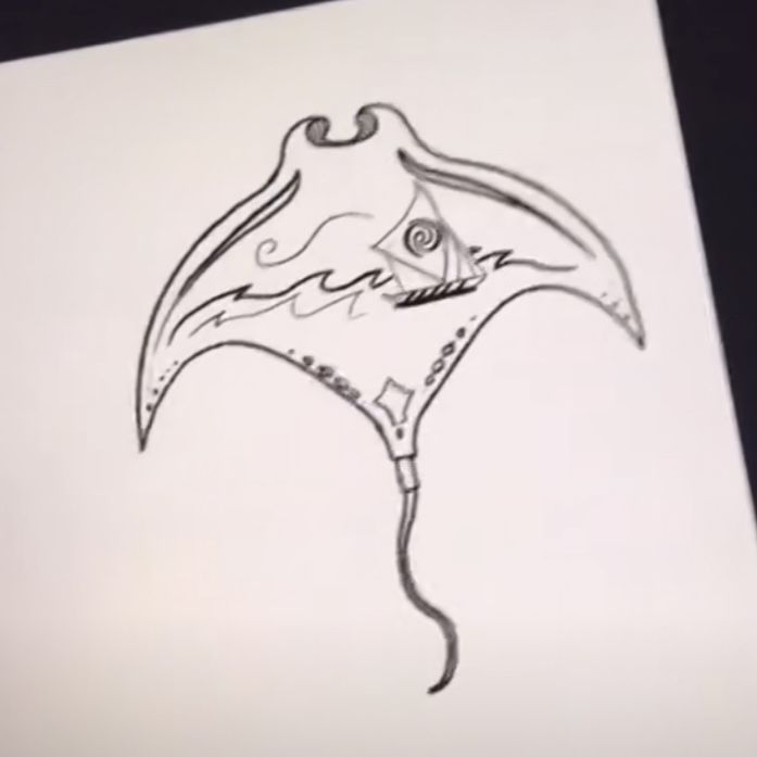 a drawing of a manta ray fish on white paper with black marker pen and ink