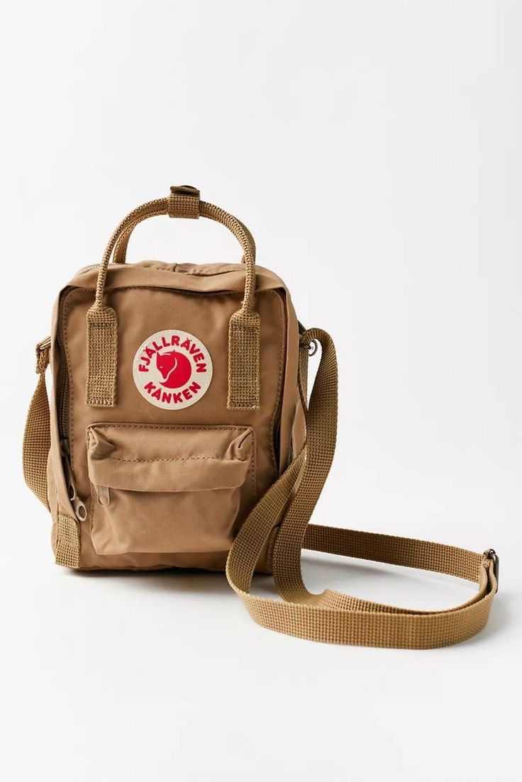 Kanken Sling Bag Outfit, Fjallraven Sling, Fjallraven Kanken Sling Bag, Fjallraven Kanken Sling, Kanken Sling Bag, Kanken Sling, Popular Backpacks, Bags Fabric, Fjällräven Kånken