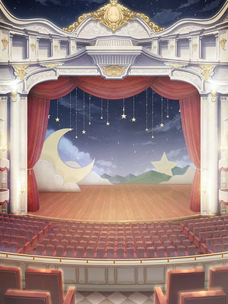 an empty theater with red seats and stars hanging from the ceiling above it's stage