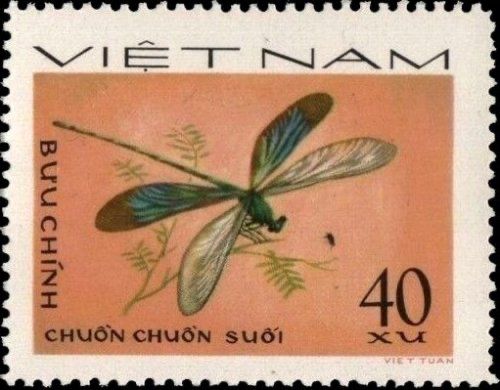 a stamp with an image of a dragonfly on it's back and the words,