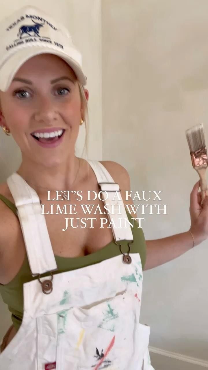 a woman wearing an apron and hat holding a wine glass in her hand with the caption let's do faux lime wash with just paint