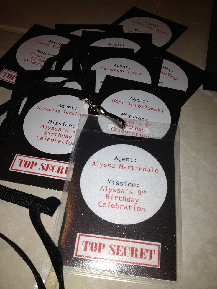 there are several tags on top of each other with scissors attached to the tags that say, top secret