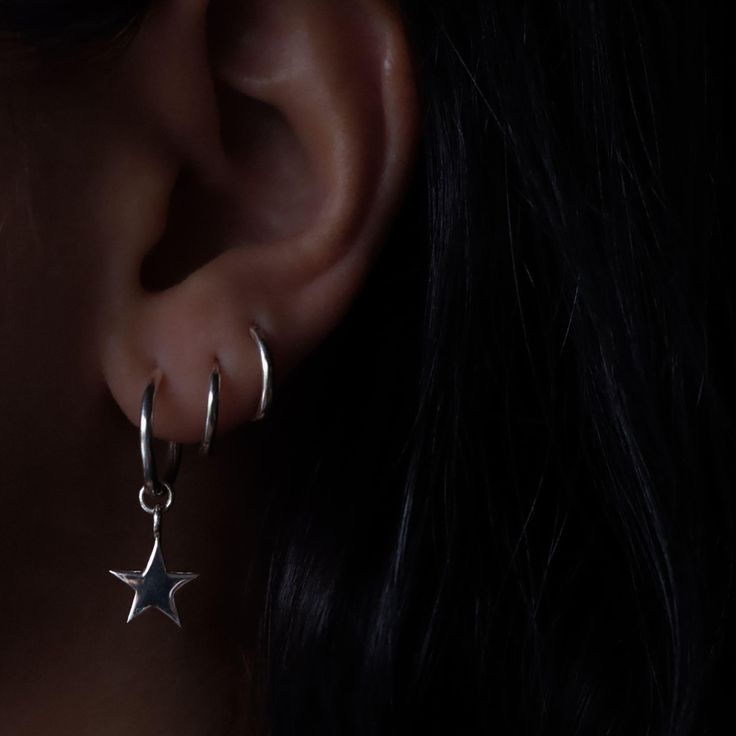 About this item Earrings with Star, handcrafted with love, feature a delicate pendant adorned with a lustrous finish that captures the essence of moonlight. Made of sterling silver 925 Measurements: Ring size: 14mm Star size: 10mm ● Want to see more jewelry from my shop?  https://www.etsy.com/shop/MURJewelryStore ● The item will be beautifully wrapped, as shown in the last picture of the listing, and ready for gifting! Our packaging includes an eco-friendly gift box and a reusable protective cas Tiny Silver Hoop Earrings, Silver Small Hoop Earrings, Sterling Silver Star Earrings, Silver Hoop Earring, Small Silver Hoop Earrings, Silver Star Earrings, Delicate Pendant, Dainty Hoop Earrings, Huggie Hoop Earrings