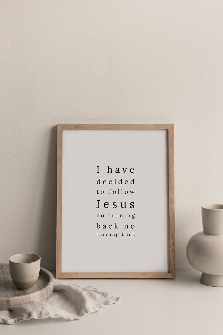 a framed print with the words i have always told to follow jesus, not turning back no