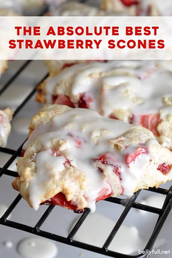 strawberry scones on a cooling rack with icing