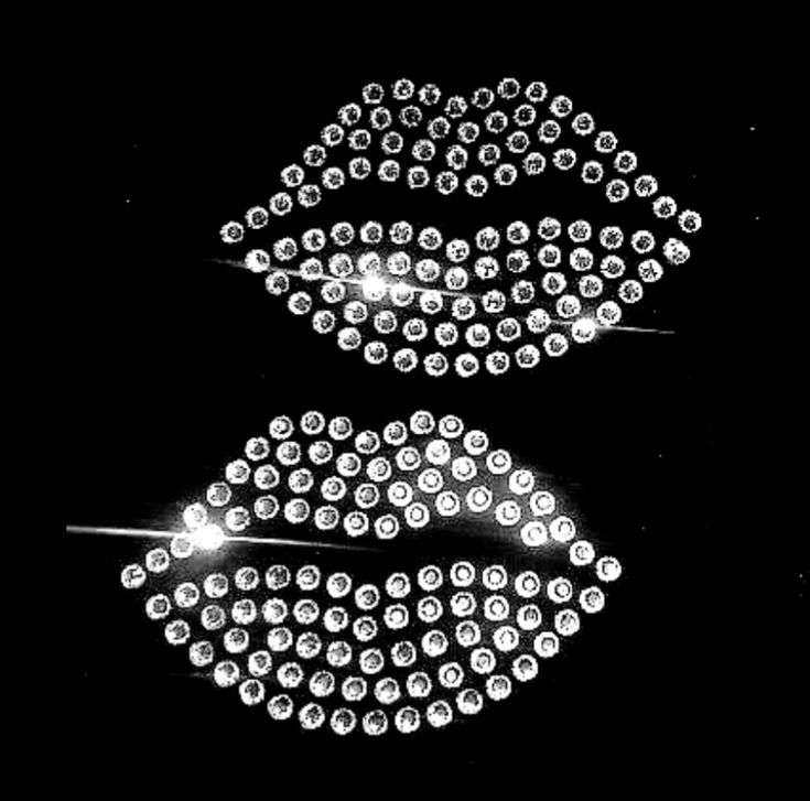 two lights that are on top of each other in the shape of lips and noses