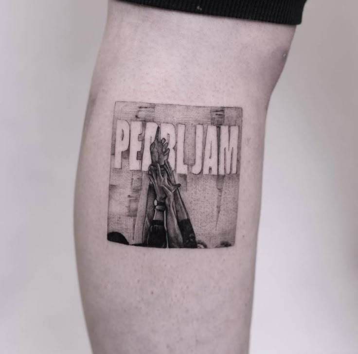 a man's leg with a piece of art on it that says pedalam