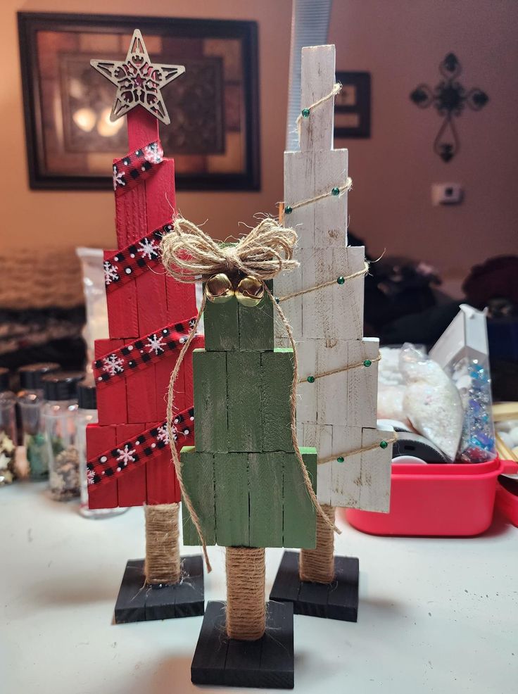 two wooden christmas trees on top of each other