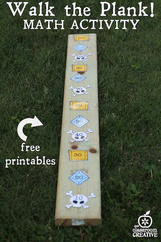 a long wooden board with numbers on it and the words walk the plank math activity